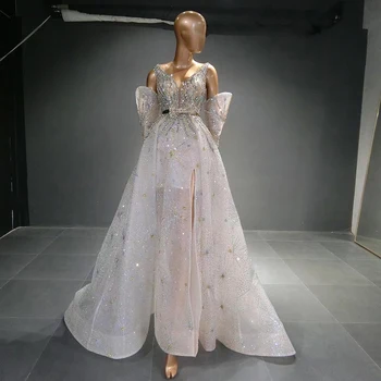 Шарън Каза Лъскав Сребристо-бели Луксозни вечерни рокли от Дубай с ръкави трапецовидна форма и цепка отстрани Елегантна жена в сватбена рокля SS573